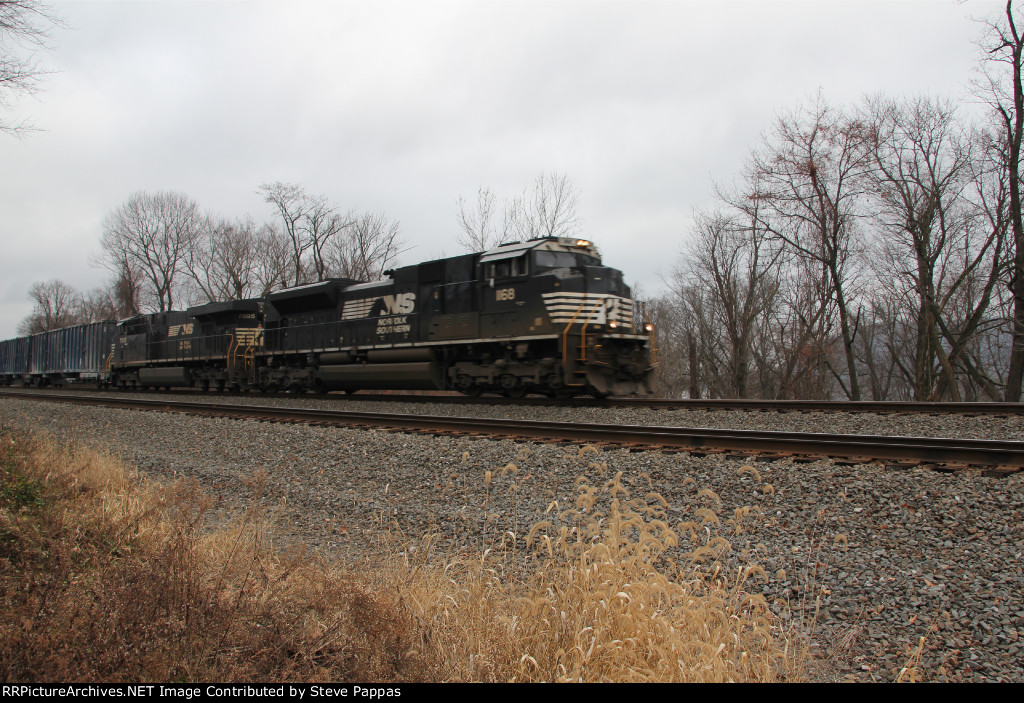 NS 1168 and 7595 with a unit trash train